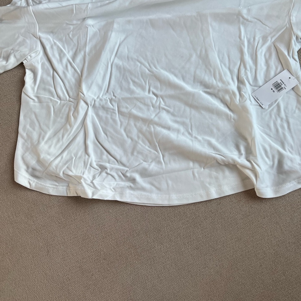 Pair of white very soft girls active tshirts with a curved back